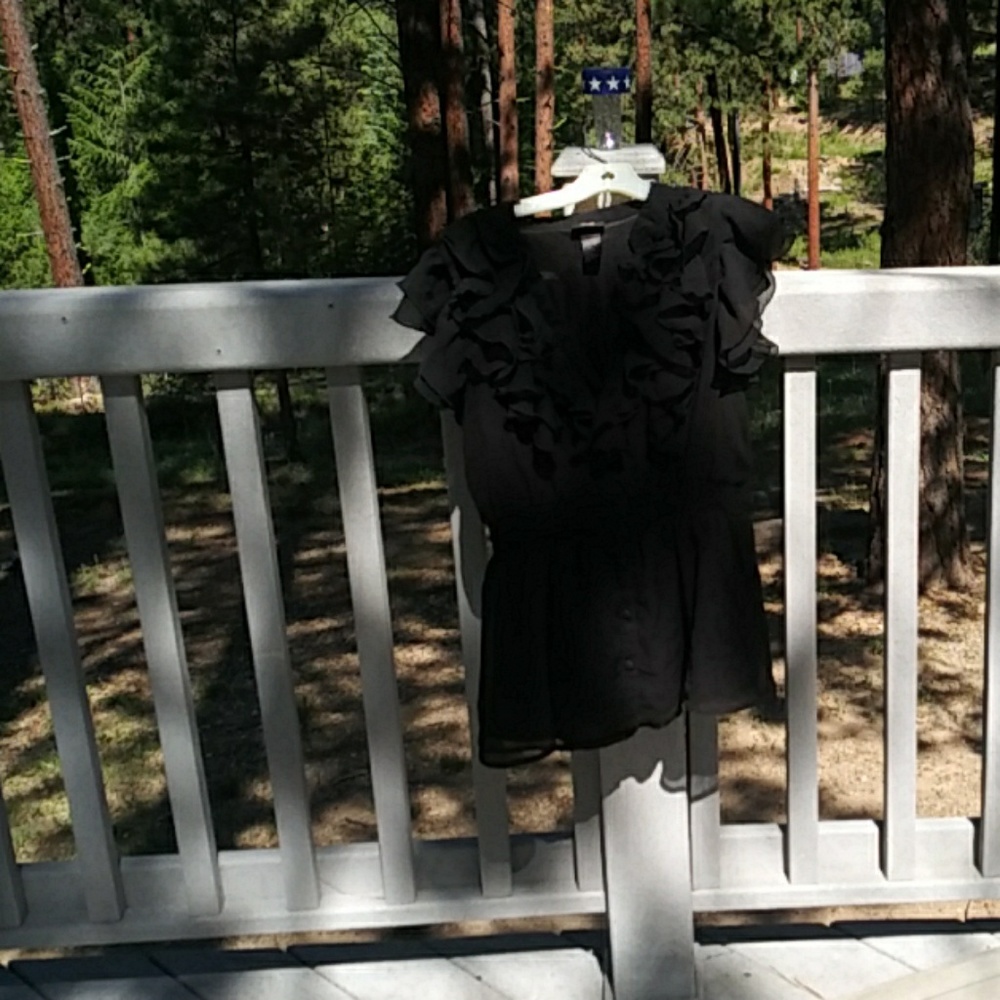 Clothing store closure...Black feminine blouse